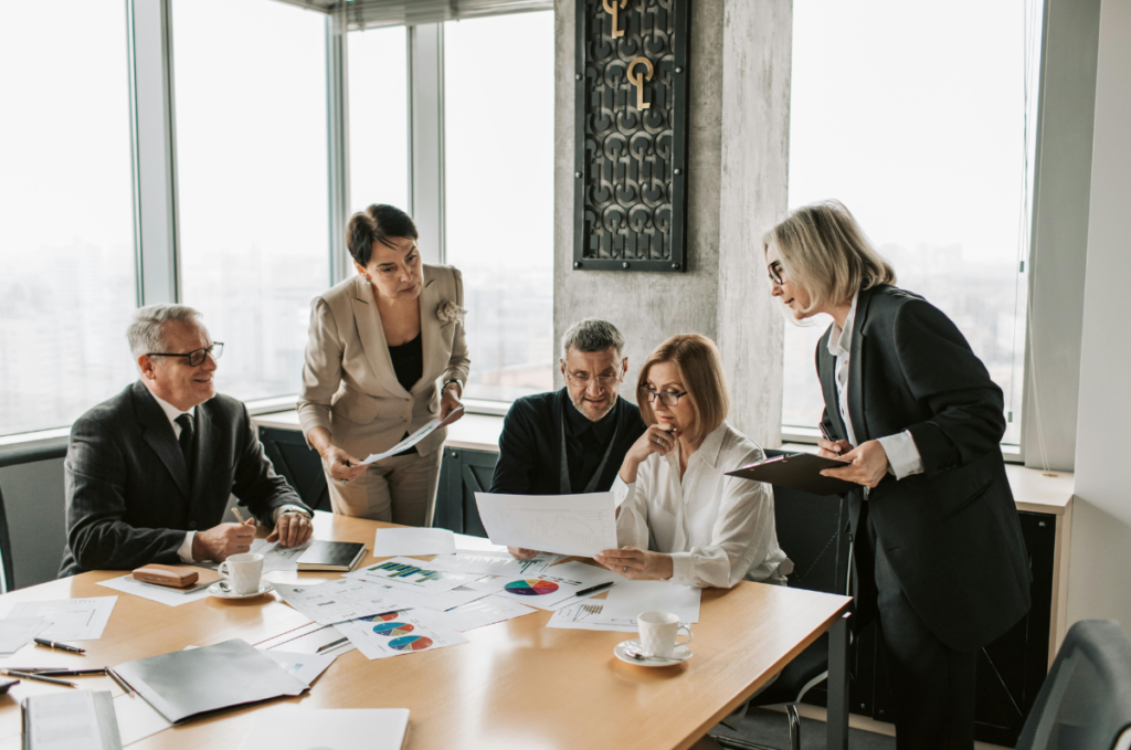 photo of a business team analyzing AI-generated data reports