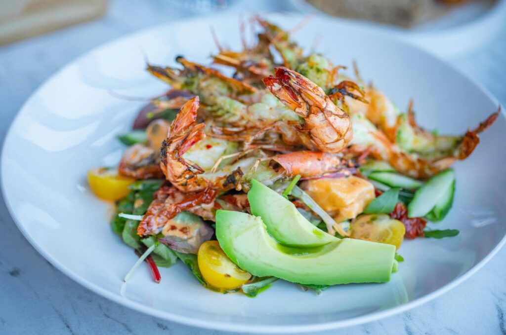 photo of a colorful plate of healthy foods